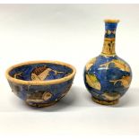 An Eastern hand painted pottery vase and bowl decorated with fish, vase H. 18cm.