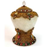 A Tibetan filigree mounted carved quartz crystal vase and cover set with semi precious stones, H.
