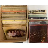 A box of mixed LP and 78 records.