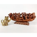 A Chinese carved wooden figure of a boat with immortals, L. 30cm (slightly A/F) together with a