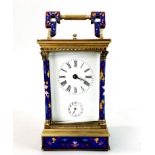 A cloisonne enamelled carriage clock, H. 21cm, glass a/f.
