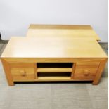 A heavy, light oak coffee table together with a heavy, light oak TV unit, largest 125 x 51 x 50cm.