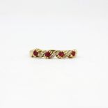 A 9ct yellow gold ruby and diamond set ring, (R ).
