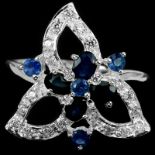 A 925 silver ring set with oval cut sapphires and white stones, (Q).