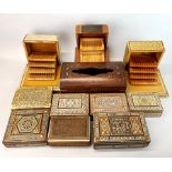 A quantity of marquetry, inlaid and other boxes, largest 28 x 15 x 10cm.