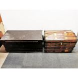 A metal and wooden chest on castors with small inside compartment 80 x 50cm together with a