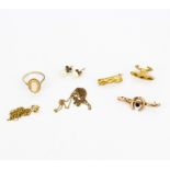 A quantity of 9ct gold and other yellow metal jewellery items.