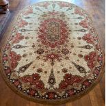 A vintage rug, 200 x 305cm.