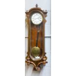A 19th century rosewood veneered Vienna regulator wall clock, H. 100cm.