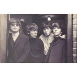 A large framed photograph on canvas after David McEnery / Robert Whitaker of The Beatles circa