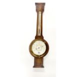An S&M Stormoguide oak barometer and thermometer, H. 75cm.