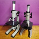 An Olympus microscope and an Opax microscope.