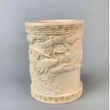 A Chinese carved faux ivory brush pot, HH. 13CM, DIA. 10