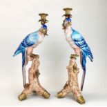 A large pair of ormolu mounted continental parrot shaped candlesticks, H. 52 & 49cm.