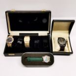 A watch case and a group of mixed watches.
