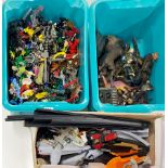 A quantity of transformer models with a quantity of Lord of the rings figures and other items.