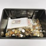 An extensive box of mixed coins.