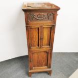 An oak cased gramophone by 'The Gramophone Co. Limited' with side door volume control and carved