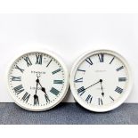 Two large battery operated reproduction metal wall clocks, dia. 50cm.