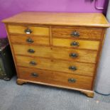 A 20th C light oak chest of drawers, 122 x 107 x 57cm.