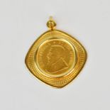 A 1988 1/10th krugerrand coin in a 9ct gold mount.