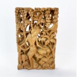 An Indonesian carved wooden panel, 19 x 30 x 4cm.