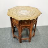 An octagonal Indian hardwood, bone inlaid coffee/ side table H. 52cm, Dia. 51cm.