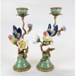 A pair of ormolu and porcelain bird candlesticks, H. 32cm.