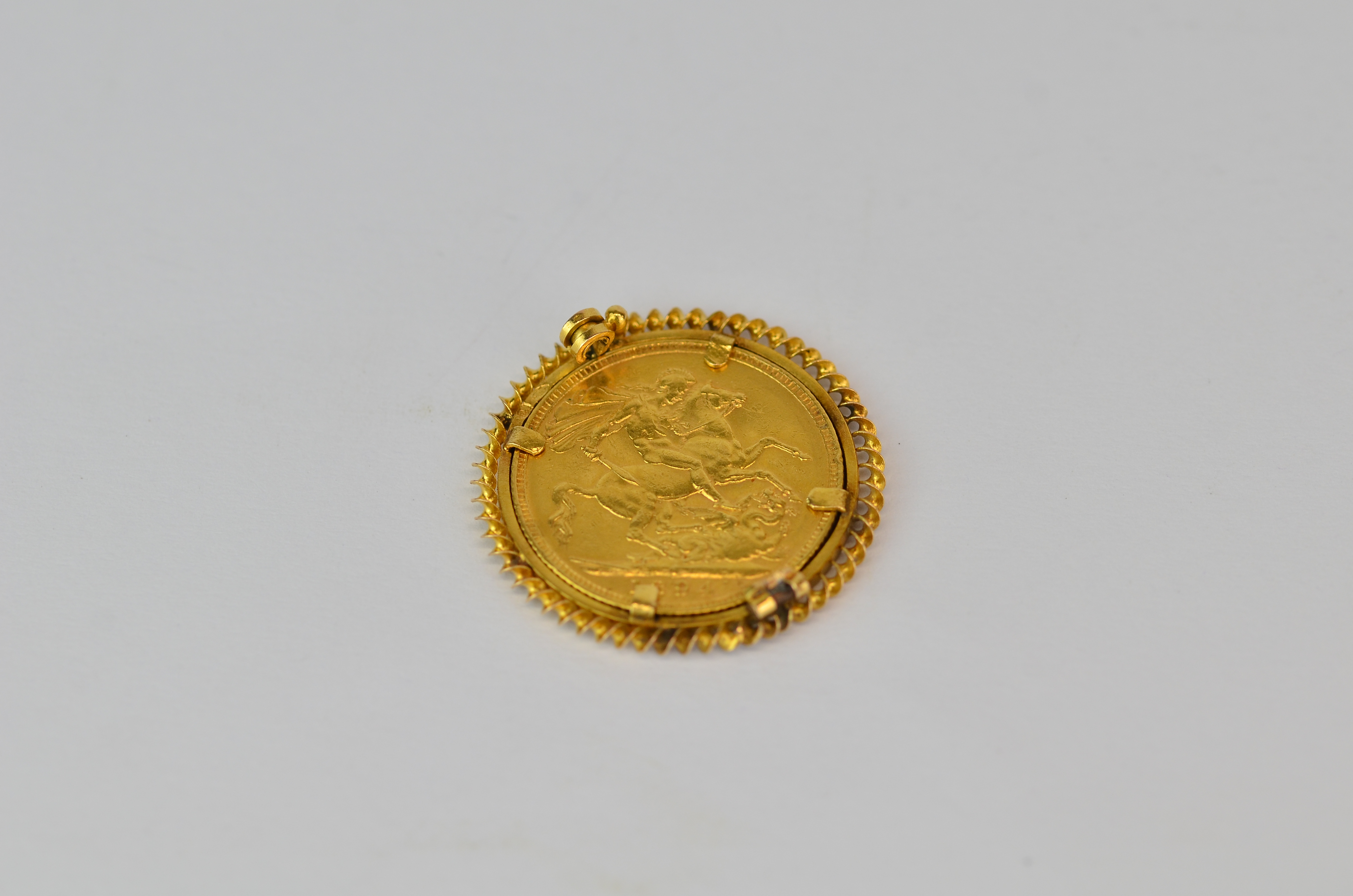 An 1894 full sovereign in a 9ct gold brooch mount, missing bar. - Image 3 of 3