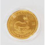 A 2018 full krugerrand coin.