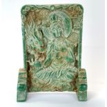 A Chinese carved jade/hardstone table screen of the goddess Guanyin, H. 24cm.