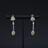 A pair of 925 silver drop earrings set with lemon yellow and white stones, L. 4cm.