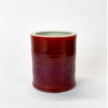 A lovely Chinese Sang de boeuf glazed porcelain brush pot, H. 11.5cm.