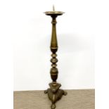 A large church style bronze/ brass pricket candlestick, H. 105cm.