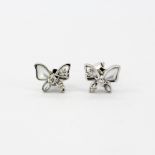 A pair of 9ct white gold butterfly shaped stud earrings set with diamonds and mother of pearl, L.