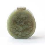 A Chinese carved jade snuff bottle decorated with children playing instruments, H. 6.1cm.