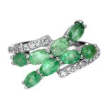 A 925 silver ring set with oval cut emeralds and white stones, (O.5).