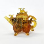 An unusual Chinese imperial yellow glass teapot/wine jug, dragon decoration to handle and lid, H.