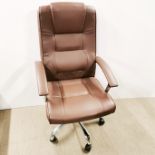A faux leather adjustable, swivel office/desk chair on wheels H. 115cm.