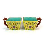 A pair of fine Chinese famille jaune enamelled square form porcelain cups, H. 6cm.