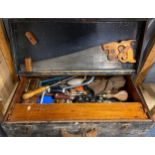 A vintage toolbox and contents including a Henry Disston and Sons D-8 saw, 66 x 38 x 17cm.