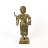 A 19th century Himalayan bronze figure, H. 19.5cm.