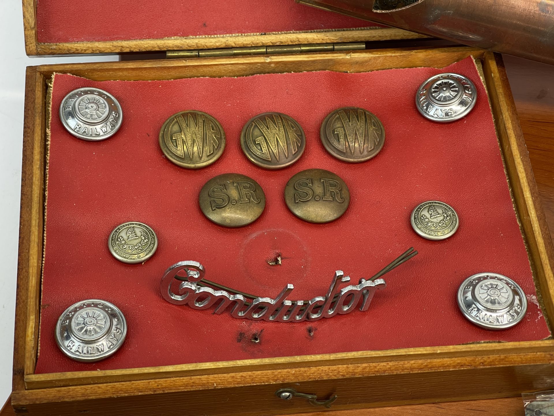 A group of railway related items including a copper steam whistle and buttons. - Image 3 of 3