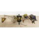 Four 1920's wrought iron and glass outdoor lamps, largest H. 40cm together with a bronze exterior