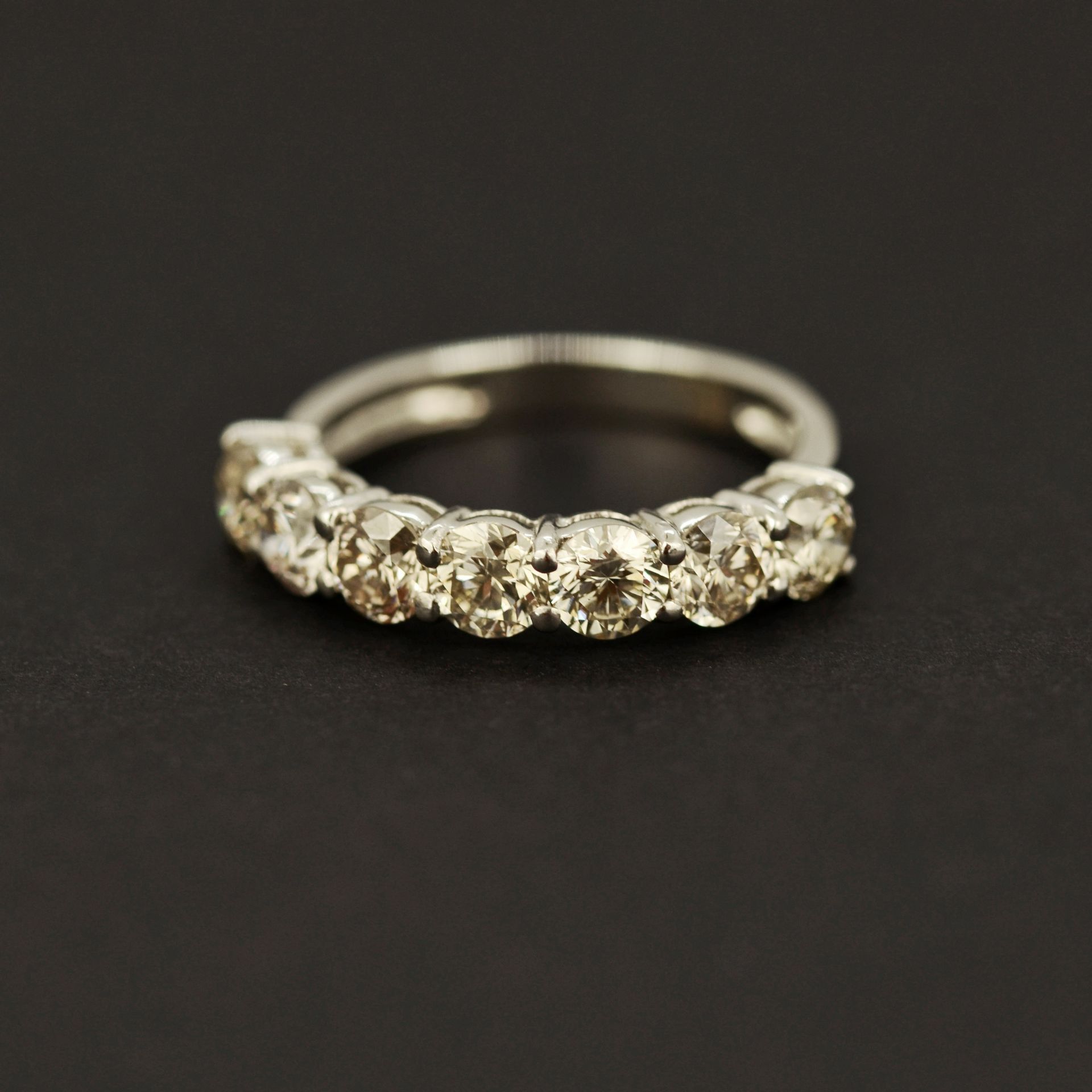 An 18ct white gold half eternity ring set with large brilliant cut diamonds, approx. 2.17ct