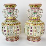 A very fine unusual pair of Chinese porcelain double vases with outer pierced body and revolving