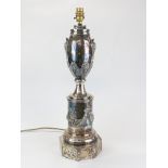 An impressive large silver plated on copper and brass table lamp base, H. 56cm.