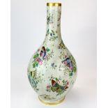 A Chinese porcelain vase decorated with butterflies, H. 39cm.