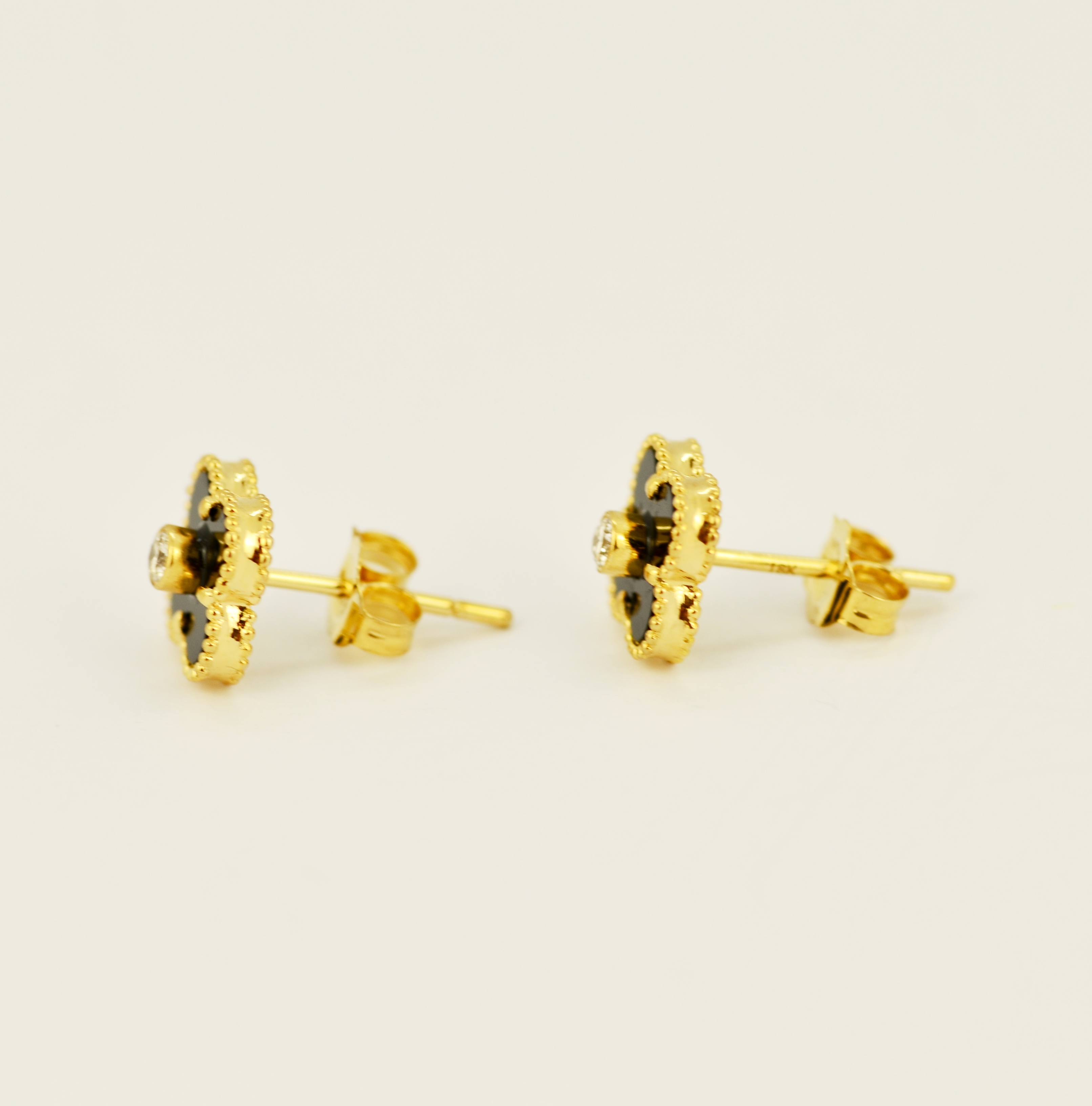 A similar pair of 18ct yellow gold (marked 18K) onyx stud earrings each set with a brilliant cut - Image 2 of 4