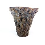 A Chinese carved horn libation cup, H. 14cm.